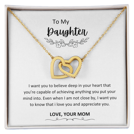 The Interlocking Hearts Necklace - A Symbol of Maternal Love and Empowerment